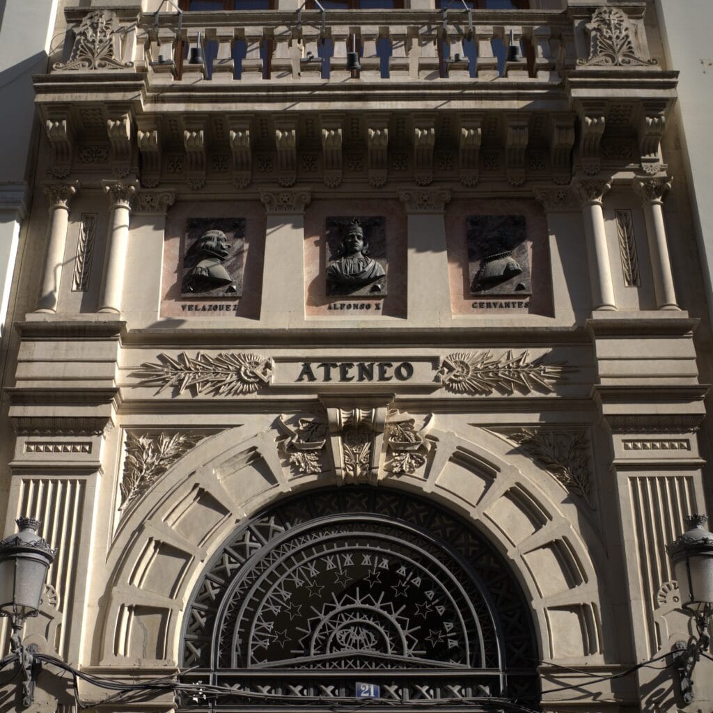 The three busts above Ateneo's door